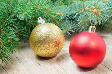 Christmas decoration fir tree and ornaments on wooden background