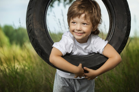 happy boy on swing