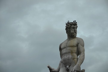 Fototapeta na wymiar Neptune statue in Piazza della Signoria, Florence, Italy