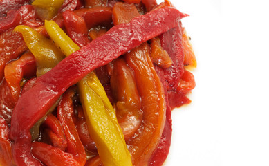 Close up of roasted peppers on white background