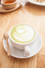 Obraz na płótnie Canvas Hot green tea latte