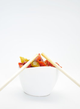 Roasted pepper salad on white background. Fusion style