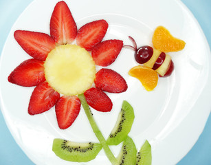 creative fruit child dessert bee on the flower form