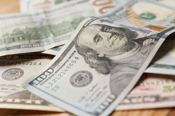 pile of 100 dollar banknotes