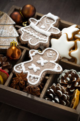 Christmas holiday symbols and cookies in a wooden box, closeup