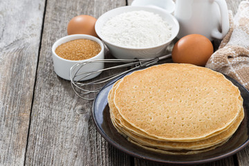 crepes and ingredients for their preparation, close-up