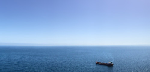 single ship on ocean panorama
