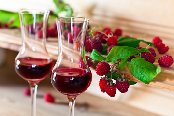 raspberry syrup and berries © Igor Normann
