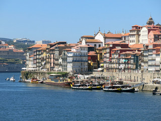 Fototapeta na wymiar Ribeira District and boats on Douro River in Porto, Portugal