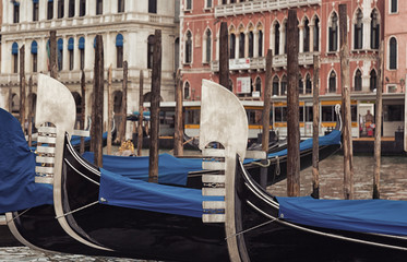 Fototapeta na wymiar Gondolas on the Grand Canal in Venice close up