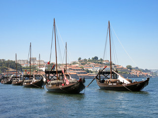 Fototapeta na wymiar Rabelo boats on Douro River, Porto