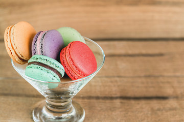 Stack Focus Image Of Colorful French Macarons On Wooden backgrou