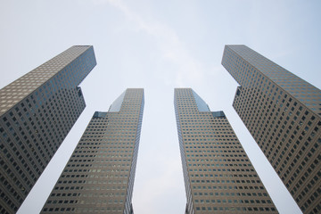 Fototapeta na wymiar SINGAPORE, OCTOBER 13, 2015: four towers of Suntec city office b
