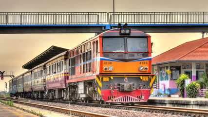 Obraz premium Passenger train duty at suburban station, 2013.