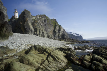 Lighthouse on the peninsula Kony. Cape Taran. The Sea of Okhotsk. Magadan Region. Russia.
