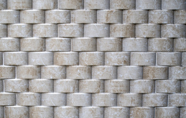 Decorative relief cladding slabs imitating cylinders