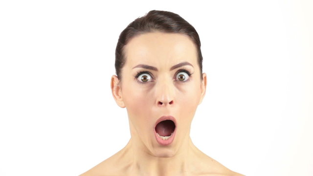 Attractive woman with her mouth open expressing surprise and shock
