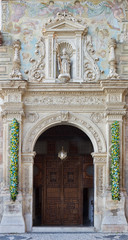 Fototapeta na wymiar Granada - The renaissance portal of st. Cecilio church