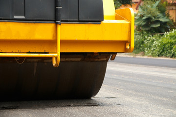 Fototapeta premium Asphalt spreader in work on site.