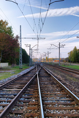Fototapeta na wymiar The rails of the railway in the long term with a beautiful sky i