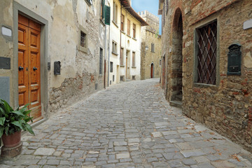 paved narrow street in italian village, Tuscany