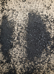Close-up asphalt at the road under construction.