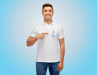 smiling man with prostate cancer awareness ribbon