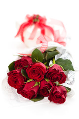 Red roses and gift.
