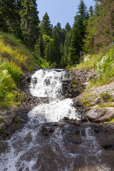 Fototapeta na wymiar Waterfall in the mountains of the Caucasus