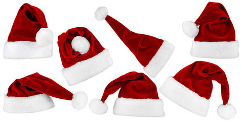 set of various santa hats isolated on white background