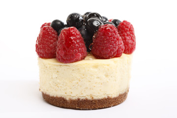 A cheesecake pastry isolated on a white background.