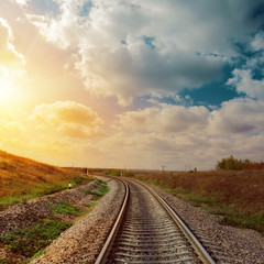 Fototapeta premium good sunset over railroad to horizon