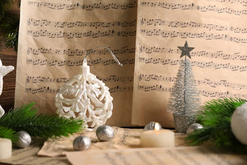Fototapeta na wymiar Music notes with Christmas decoration close up