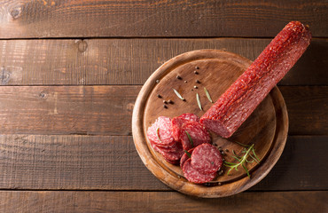 salami sausages on a wooden table