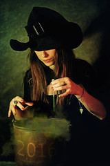 witch preparing potion for 2016 happy new year