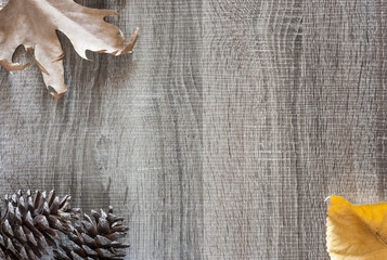 Autumn frame background on a wooden surface
