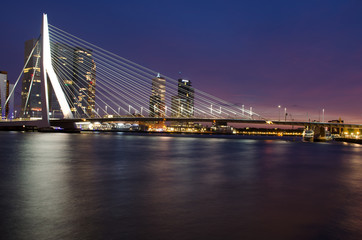 Fototapeta na wymiar Erasmus Bridge and Rotterdam Skyline at Twilight, Zuid Holland, The Netherlands