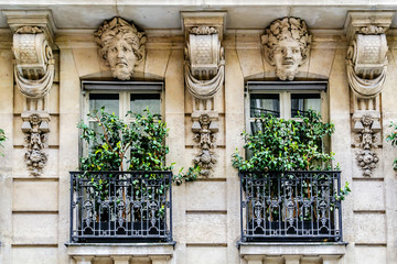 French house with traditional balconies and windows. Paris - obrazy, fototapety, plakaty