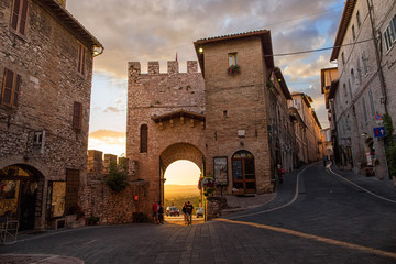 Beautiful alley in the ancient town of Assisi, Umbria, Italy - obrazy, fototapety, plakaty