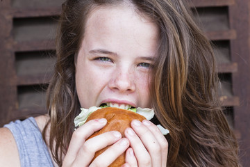 Girl Eating Sandwich bread roll