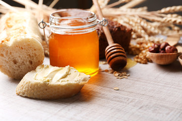 Healthy breakfast with bread, honey, nuts. Country breakfast concept
