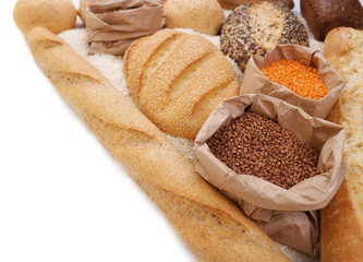 Composition of mixed breads and grains on white background