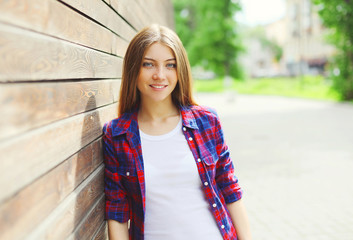 Pretty young girl wearing a casual clothes in summer day