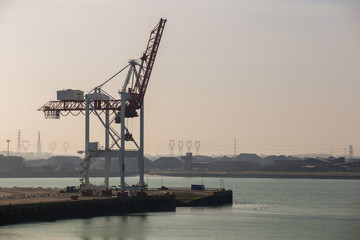 Fototapeta na wymiar Container Port Cranes