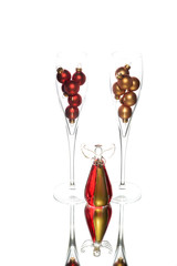 Two glasses with Christmas angel decoration reflection