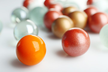 Different balls isolated on white, individuality concept