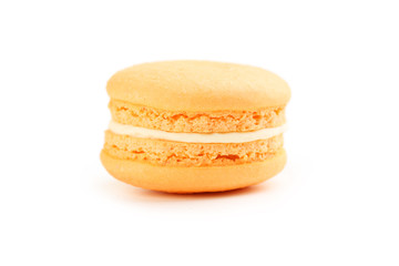 Tasty orange macaron isolated on white