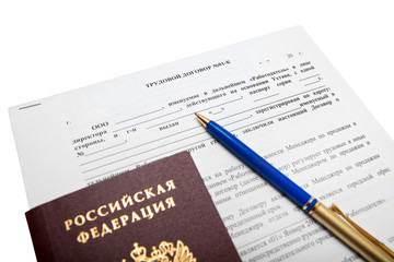 Russian employment contract as sales Manager with pen and passport
