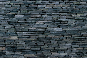 Obraz premium Brick wall made of stone