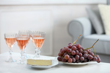 Table at home with food and drinks for friends